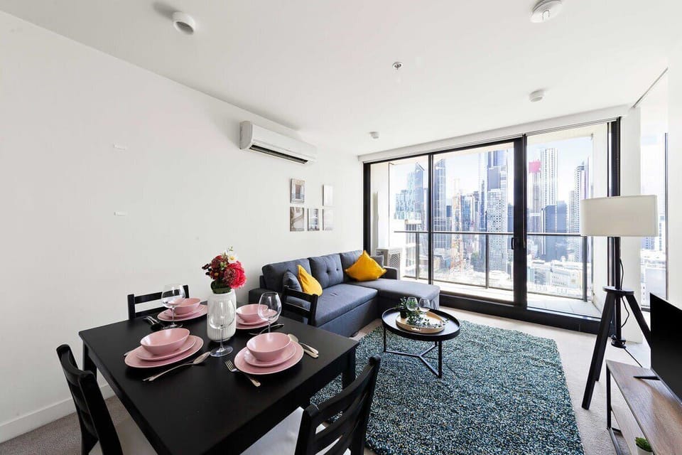 A spacious living with a 3-seater sofa bed that folds out to a double.