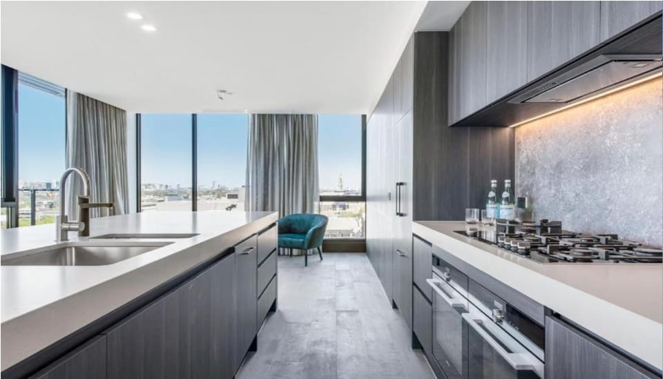 Penthouse | Private kitchen | Fridge, oven, stovetop, dishwasher