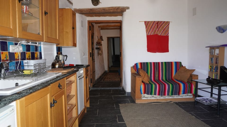 Kitchen and living area in Pablito looking through to the bedroom.