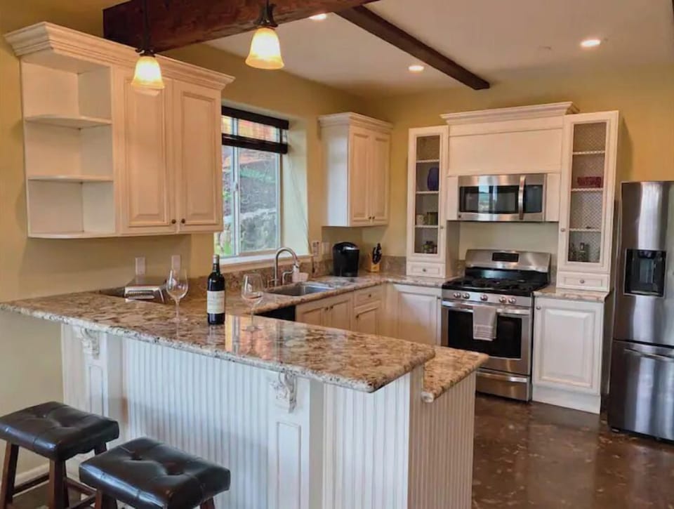 Kitchen bar, perfect place to work on a laptop or enjoy a bottle of wine