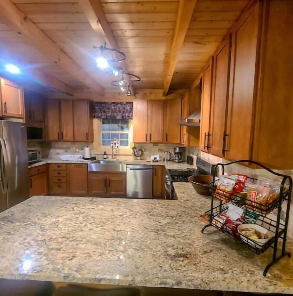 Spacious kitchen including gas range, dishwasher, microwave, toaster oven, etc.!