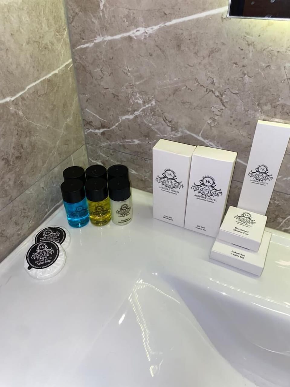 Shower, rainfall showerhead, designer toiletries, hair dryer