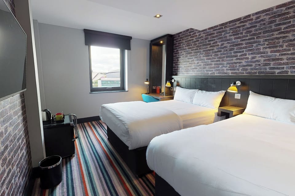 Family Room, 2 Double Beds | Desk, laptop workspace, blackout drapes, iron/ironing board