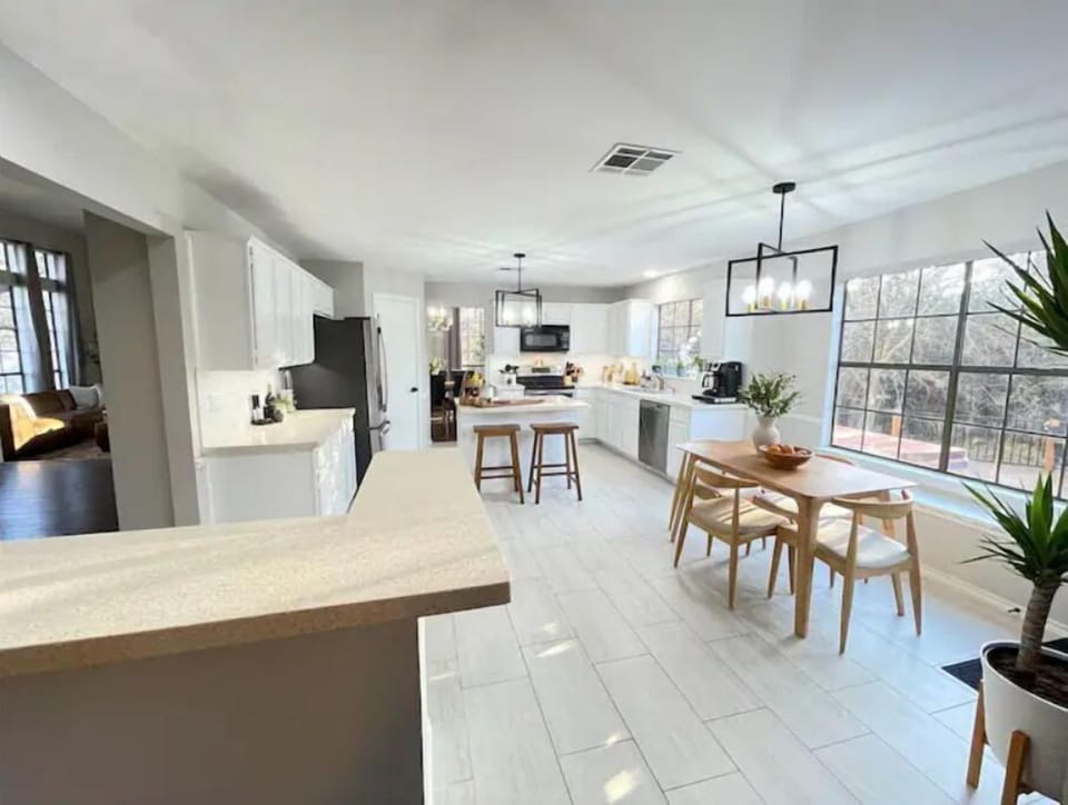 Open airy space with amazing views of nature in every window!