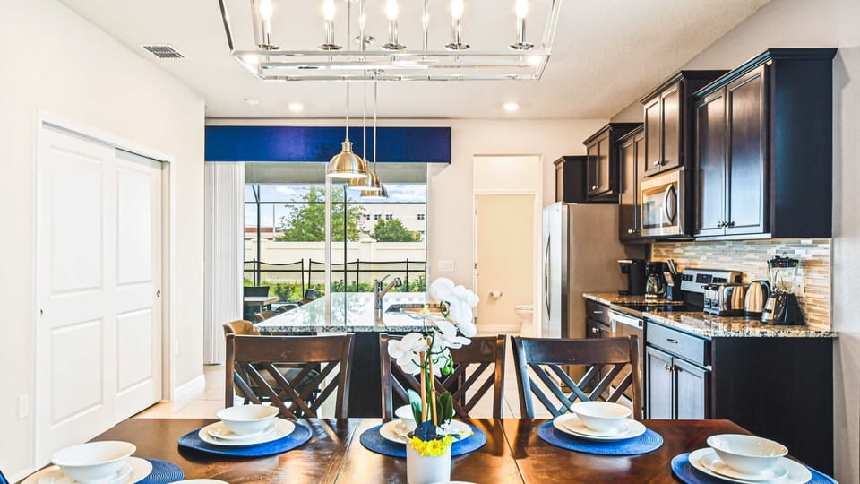 Dine in elegance and comfort in our spacious dining area, offering you the perfect setting for enjoying meals and creating memorable moments during your stay.