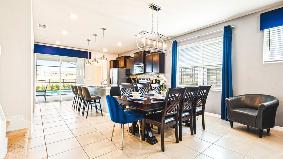 Experience the joy of shared meals in our inviting dining area, providing you with a cozy and welcoming space to gather with loved ones during your stay.
