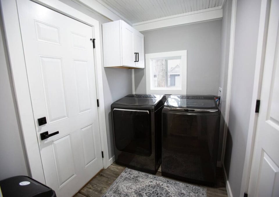 Laundry room with washer and dryer