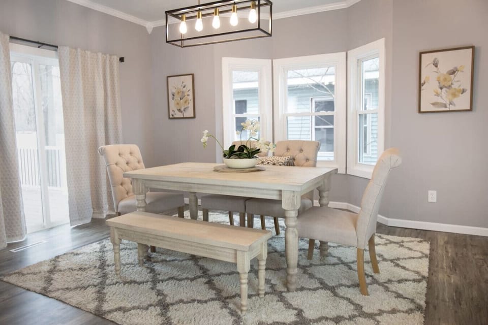 Modern dining room with bench and chairs
