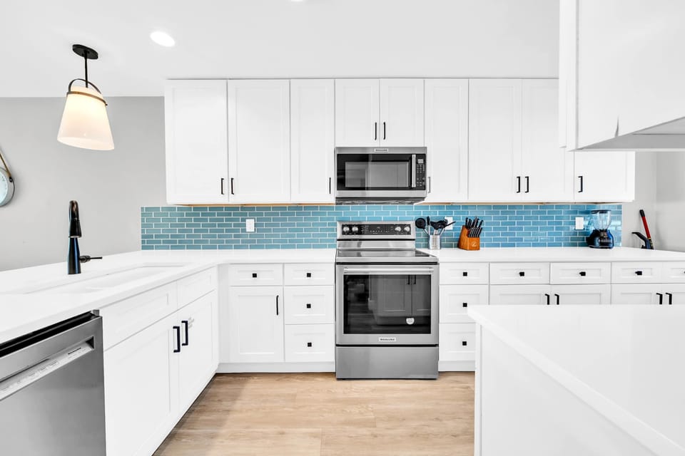 2nd Level The Newly Remodeled Kitchen Features Stainless Steel Appliances and High End Finishes. 