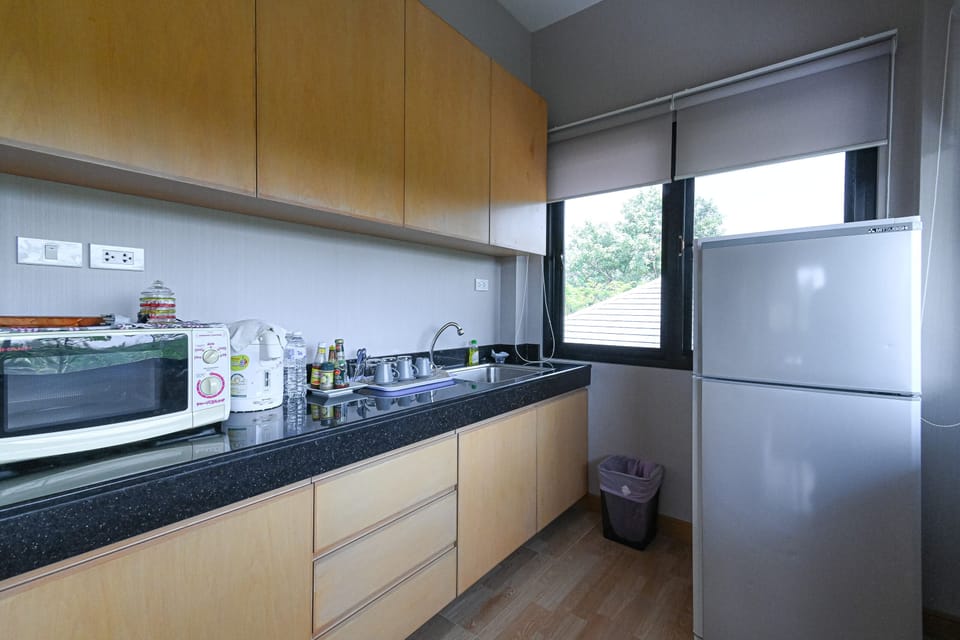 Junior Suite Garden View | Private kitchen