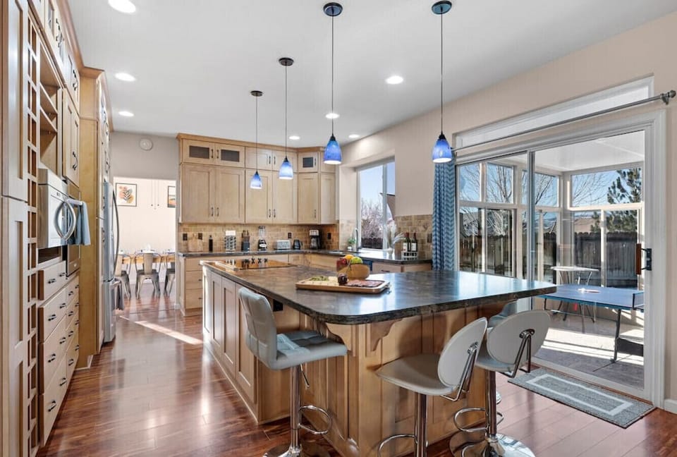 Our updated kitchen is a chef's dream, with all of the appliances you could need and a large island with additional seating. It's the perfect place to cook a delicious meal for the whole family!