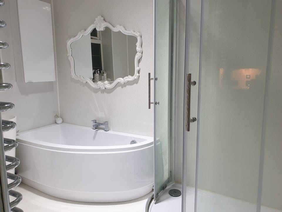 Rainfall showerhead, slippers, towels