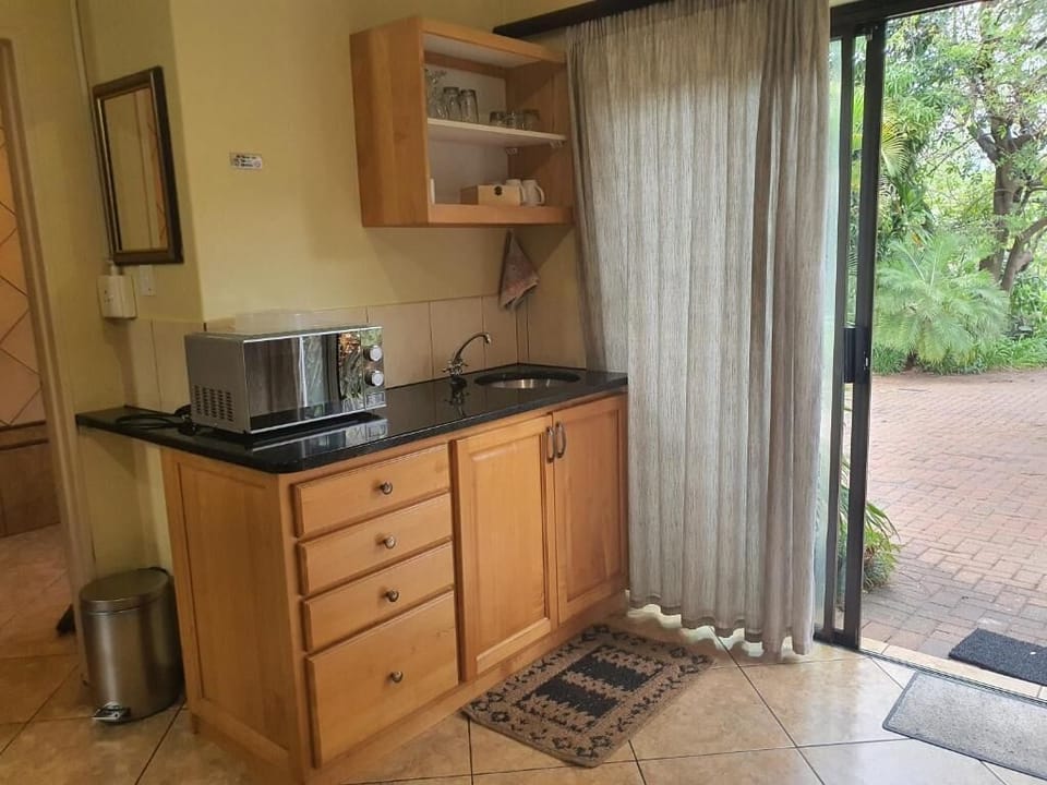 Classic Triple Room | Private kitchen | Coffee/tea maker, fridge, microwave, electric kettle