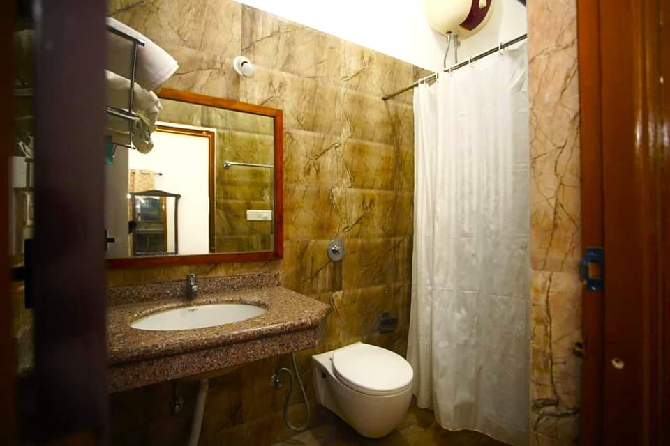 Combined shower/tub, free toiletries, hair dryer (on request), slippers