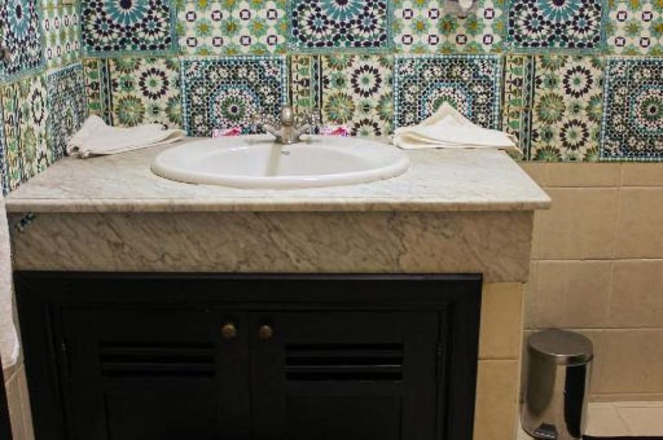 Bathtub, hair dryer, bathrobes, bidet