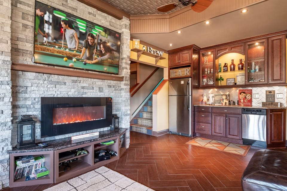 Cozy up downstairs with TV, fireplace, and wetbar