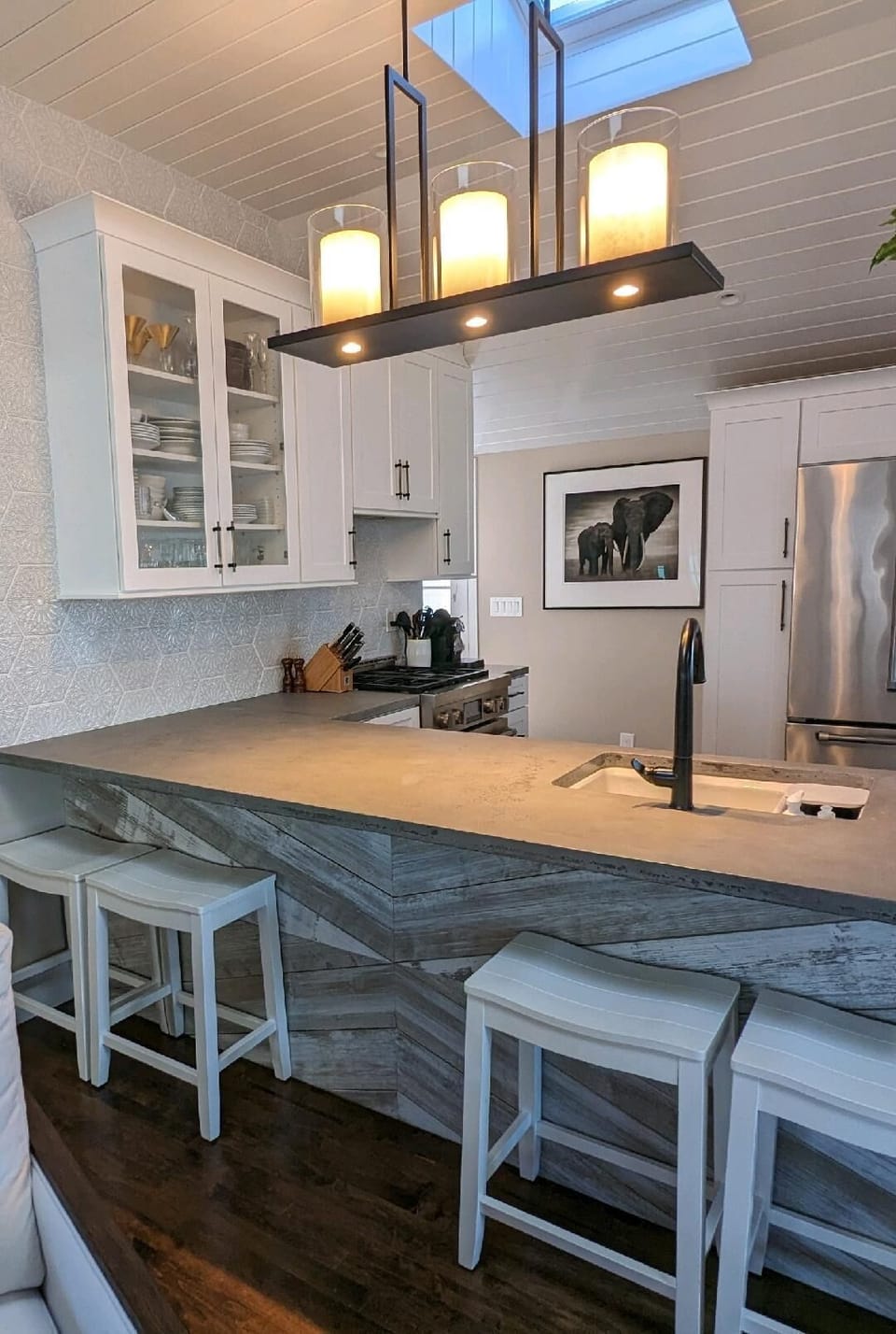 Concrete counters and bar seating for four