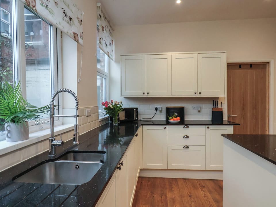 Fridge, electric kettle, toaster, cookware/dishes/utensils