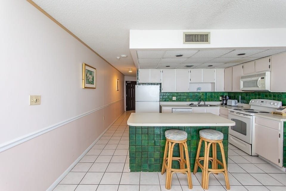 Condo, 2 Bedrooms | Private kitchen | Coffee/tea maker, fridge, oven, toaster