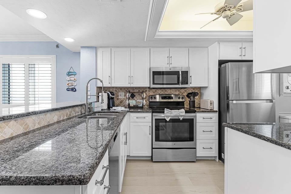 Condo, 2 Bedrooms | Private kitchen | Coffee/tea maker, fridge, oven, toaster