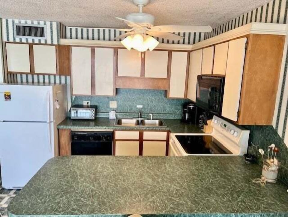 Condo, 2 Bedrooms | Private kitchen | Coffee/tea maker, fridge, oven, toaster