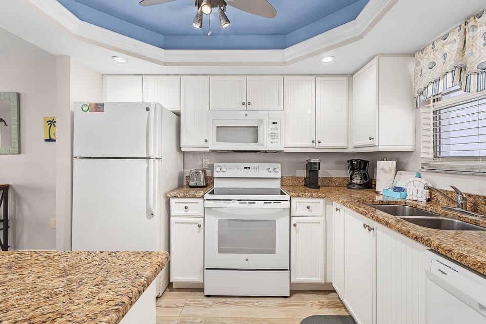 Condo, 2 Bedrooms | Private kitchen | Coffee/tea maker, fridge, oven