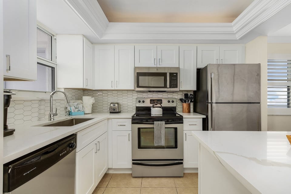 Condo, 2 Bedrooms | Private kitchen | Coffee/tea maker, fridge, oven, toaster