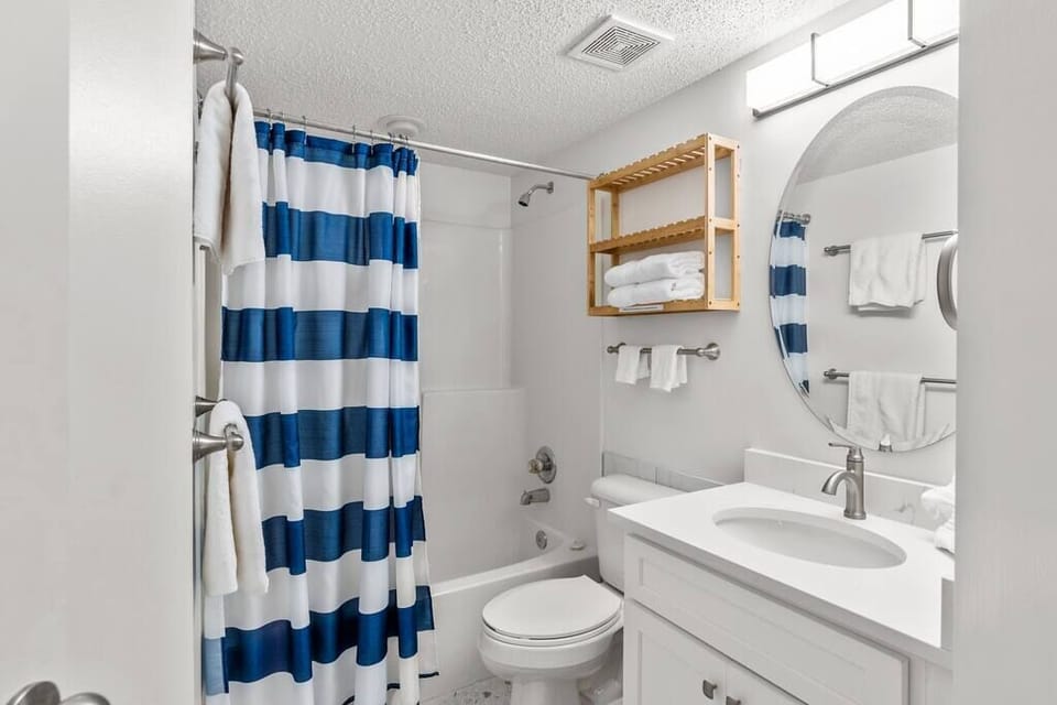 Bedrooms 2 and 3 share this newly remodeled bathroom!