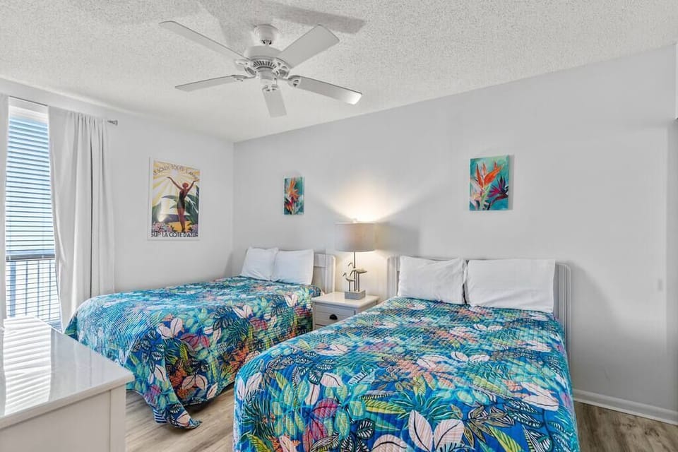 Bedroom 3 has 2 double beds. It is just steps away from the bathroom it shares with bedroom 2. 