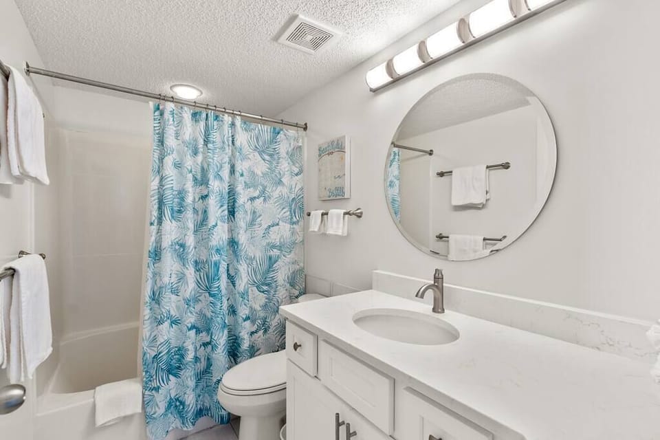 The  newly remodeled master bath is attached to the master bedroom. 