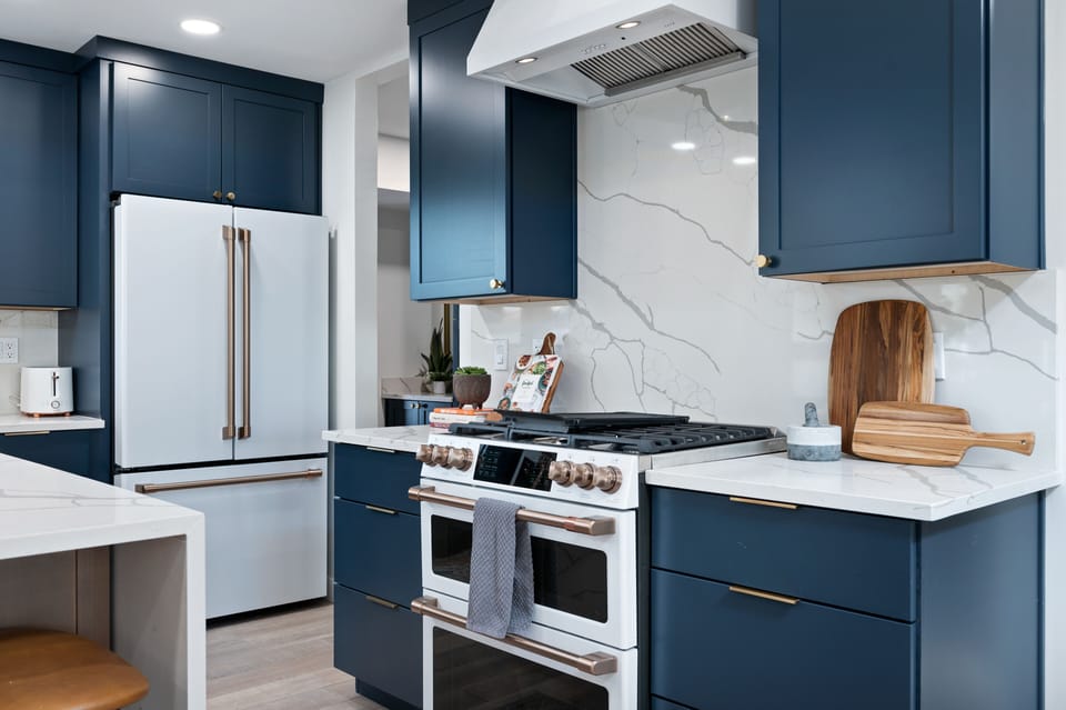 Gas stove and double ovens. Double dour fridge with pull out fridge.