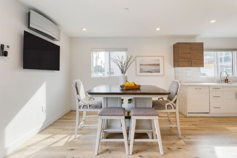 Dining area features a second TV (Unit B).