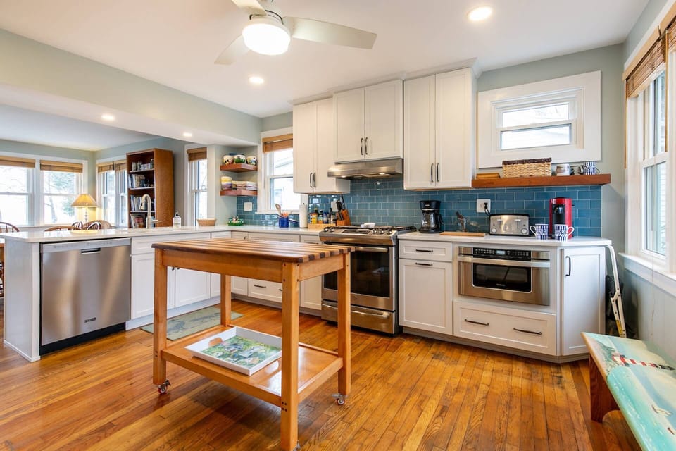 The beautifully-renovated kitchen has all new stainless-steel appliances.