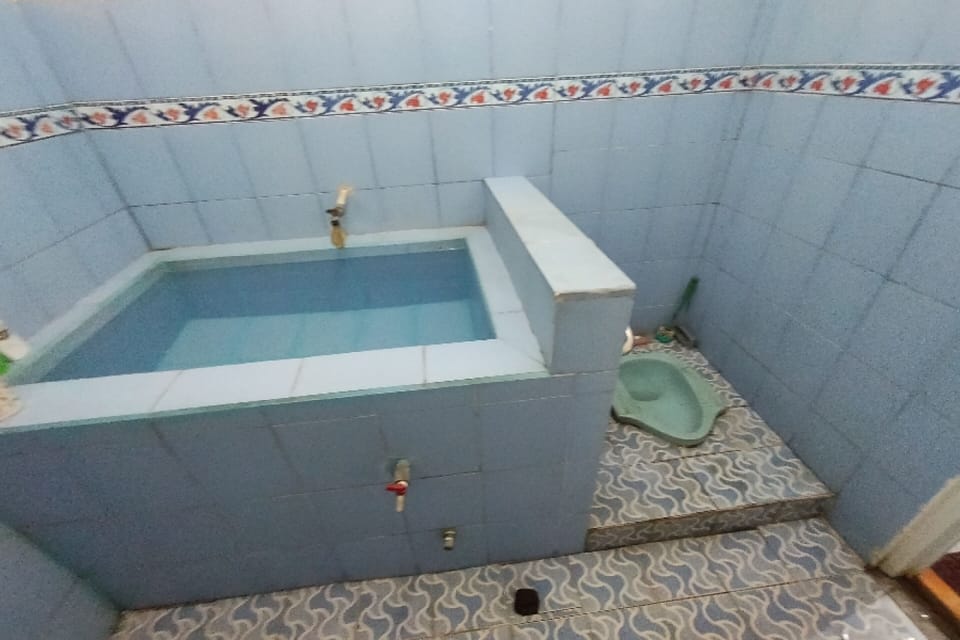 Double Room | Bathroom | Shower, towels, toilet paper