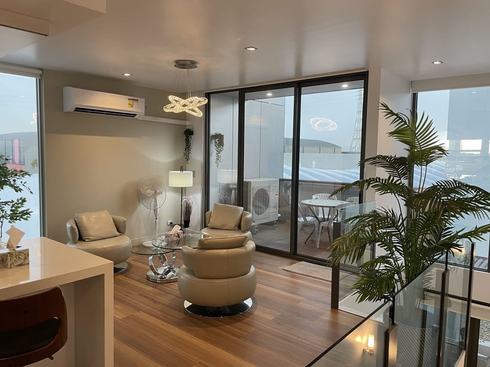 Premium Penthouse | Living area | Computer monitors, printers
