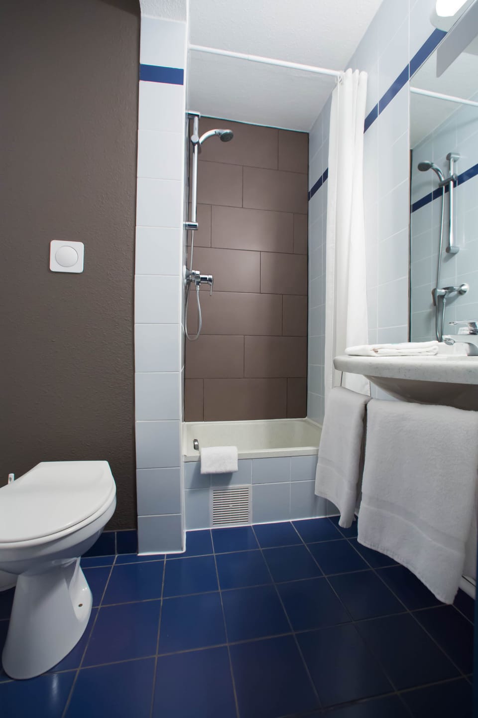 Shower, hair dryer (on request), towels