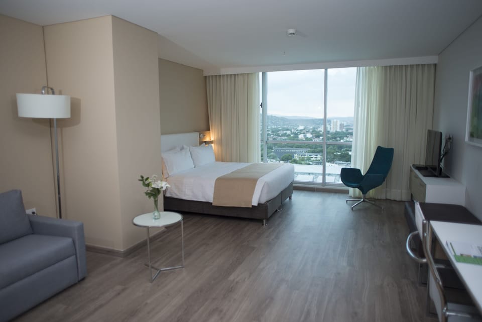 Junior Suite, 1 King Bed | Minibar, in-room safe, desk, soundproofing