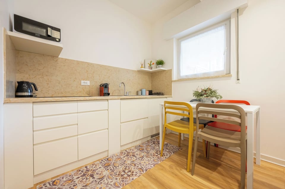 Comfort Apartment | Private kitchen | Full-size fridge, microwave, cookware/dishes/utensils, cleaning supplies