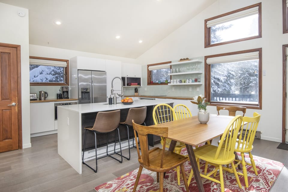Dining Room Area and Kitchen with Breakfast Bar and Island (2nd Floor)