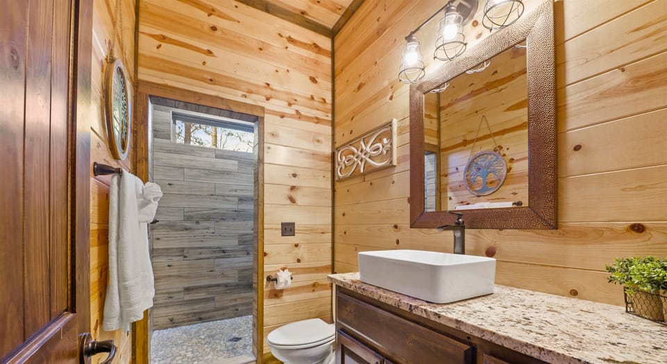 Experience a refreshing shower in this beautifully designed bathroom.