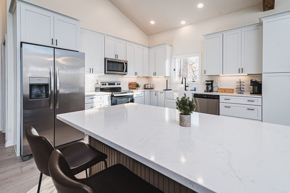 The kitchen offers plenty of storage and access to host a large group