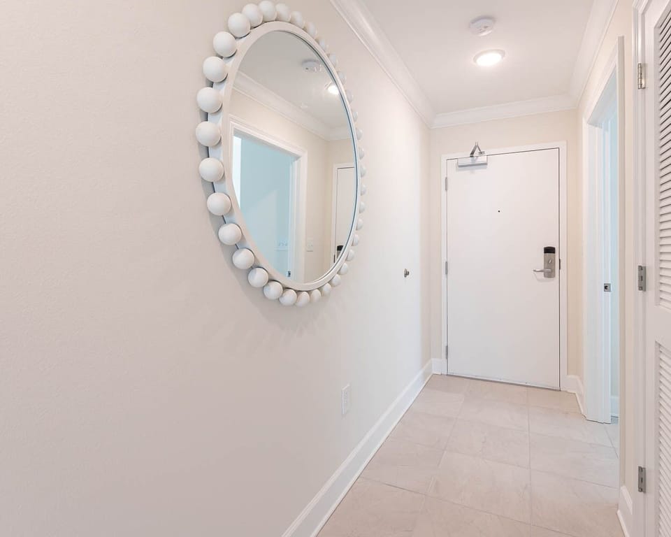 Step into the entryway of this charming beach vacation rental awaiting your arrival