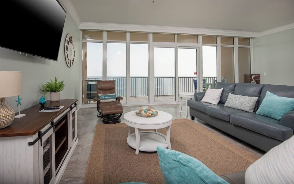 Sink into the cozy sofa with a queen sleeper and enjoy stunning views of the beach