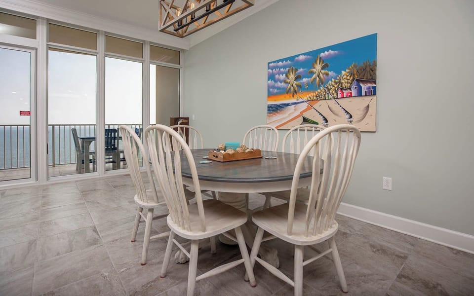 Enjoy family meals at the dining table or a fun game night and create memorable moments with a beach view