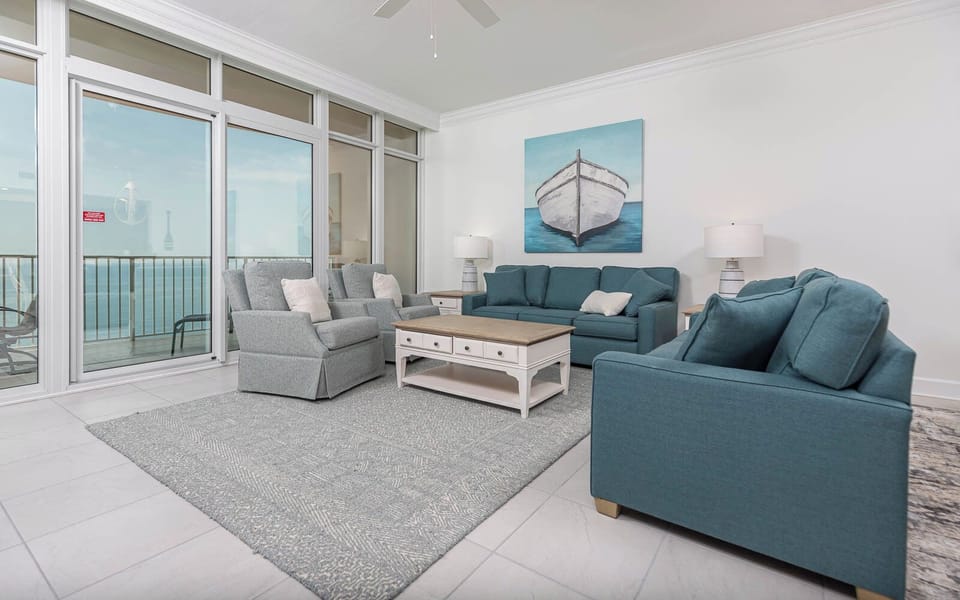 Sink into the plush sofa with a queen sleeper and listen to surf rolling in from the beach from the balcony