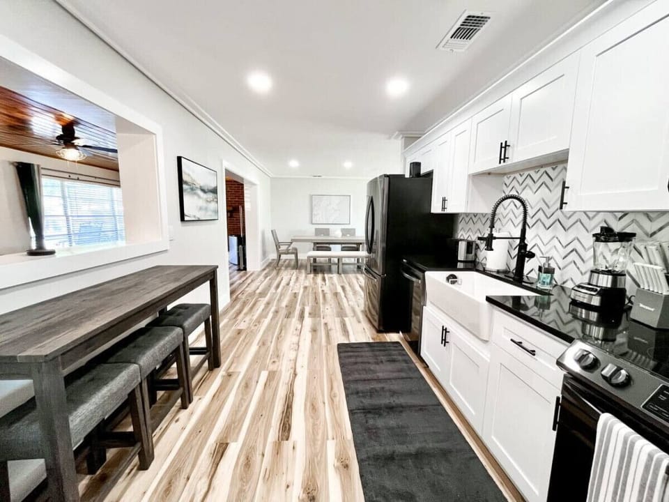 Open Layout Kitchen w/ Comfy Bar Stool Seating for Three