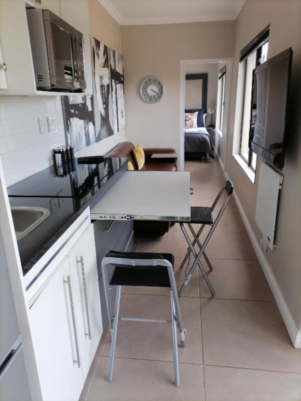 Pull-out table to work or dine.