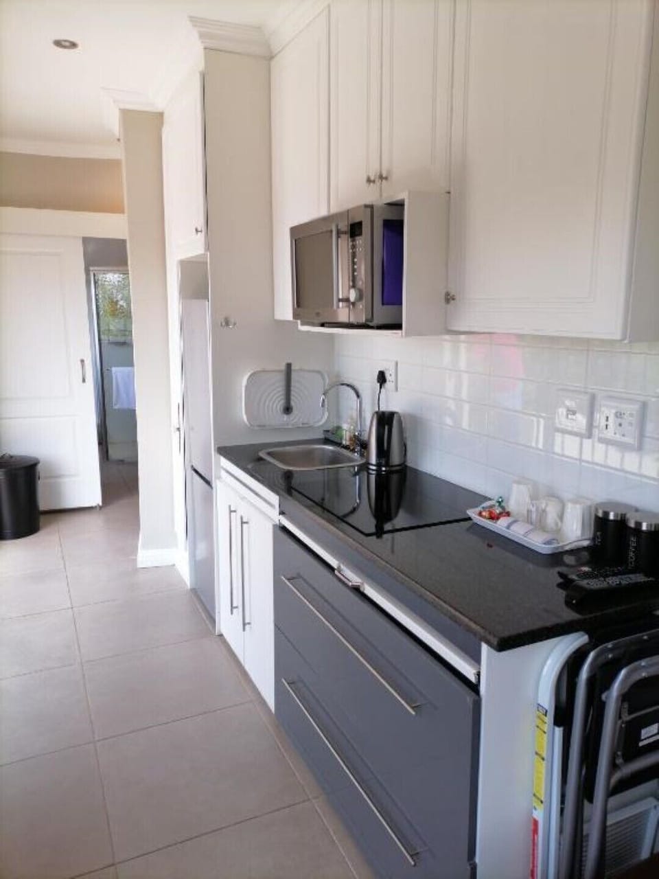 Modern kitchen with upmarket appliances.