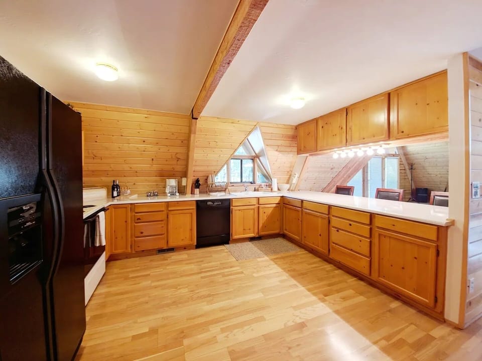 Large kitchen with an abundance of storage and countertop space.