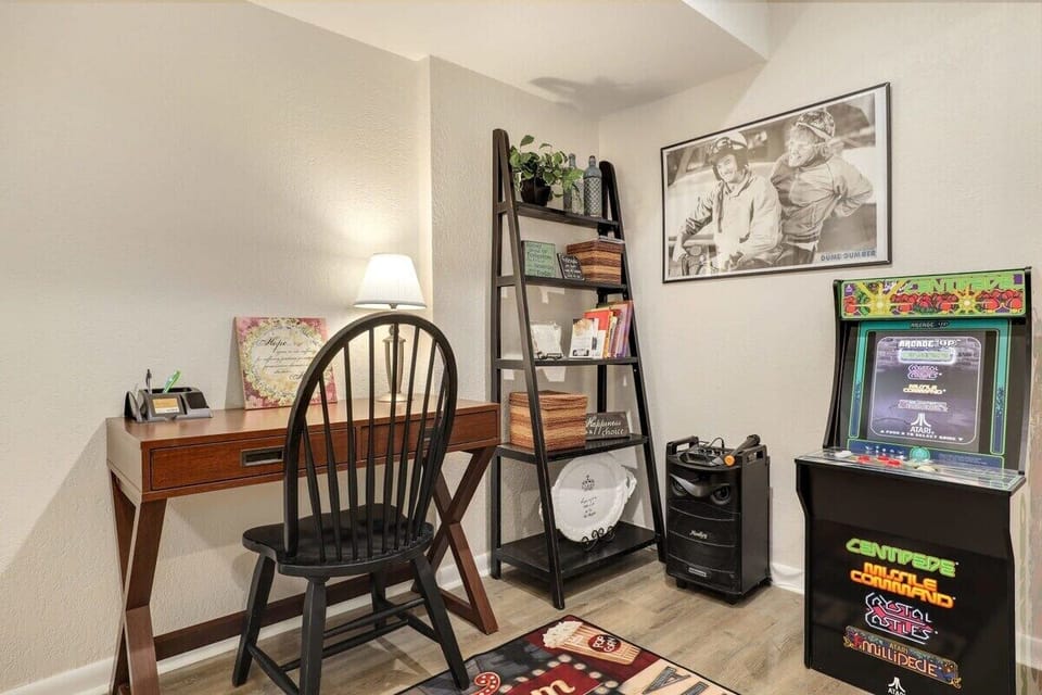 You'll find our arcade game and desk area in the corner of the room.